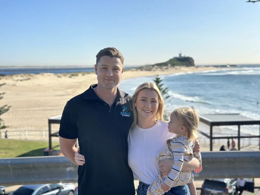 Gus Rae with his family at the beach
